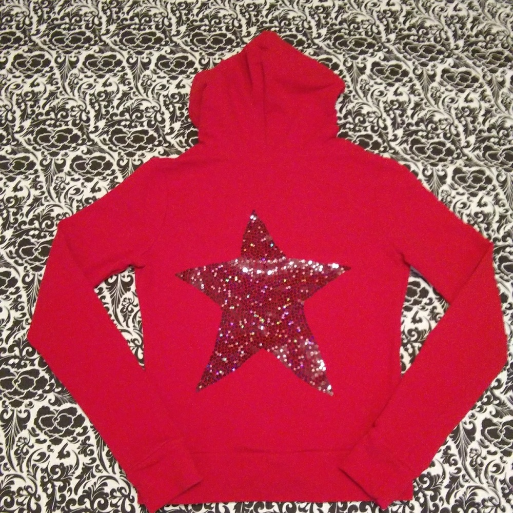 Red hoodie with sequin star on back